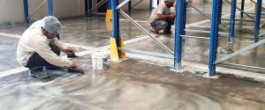 mapei-adesilex-p9-filler-application-prior-to-epoxy-floor-coating-in-Dubai mapei-adesilex-p9-filler-application-prior-to-epoxy-floor-coating-in-Dubai